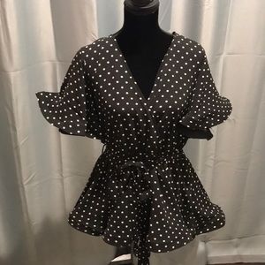 Black and white polka dot mock wrap blouse